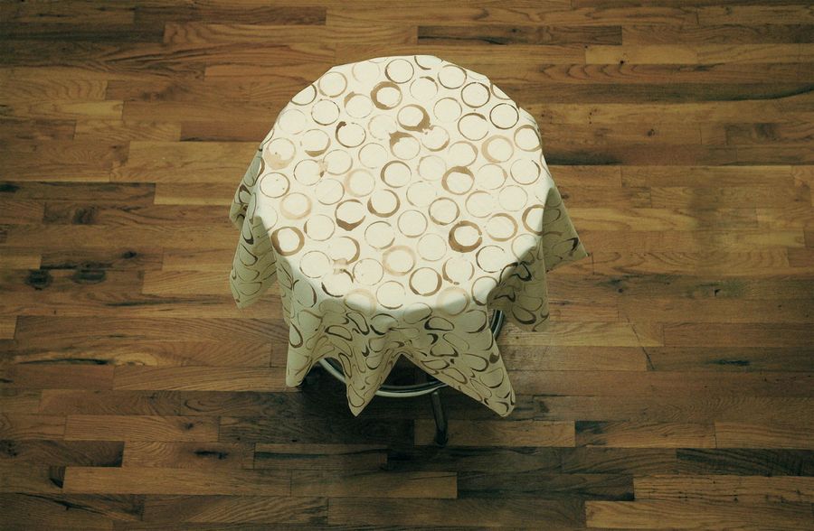 Marek Milde â€œThe Same and Not the Sameâ€ 2009, coffee table, tablecloth, coffee, diameter 37 inches